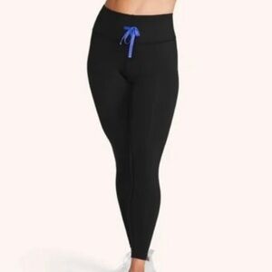 PELOTON PRECISE AND CHARGED HIGH RISE TIE FRONT
LEGGING